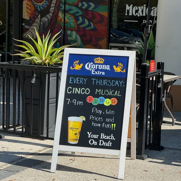 A Don Julio's sign advertises "Cinco Musical Bingo" on Thursdays with a Corona Extra beer graphic.